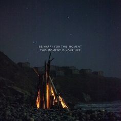 a campfire with the words be happy for this moment that moment is your life