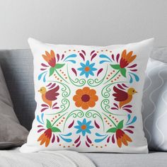 a decorative pillow on a couch