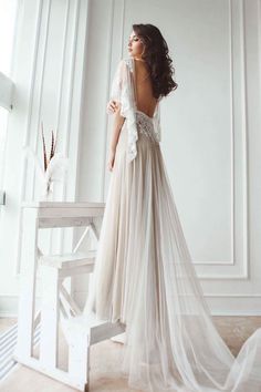 the back of a woman's wedding dress