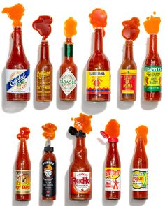 an assortment of hot sauces and condiments arranged in the shape of bottles