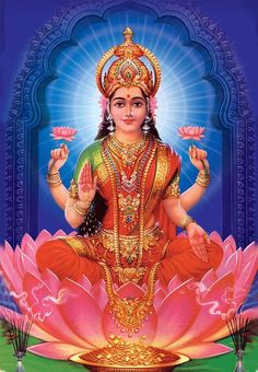 the hindu goddess sitting on top of a lotus