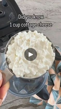 someone is holding a knife over a cup with cottage cheese in it and the words, did you know? 1 cup cottage cheese