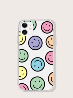 an iphone case with smiley faces on it