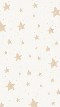 a white and gold wallpaper with stars on it