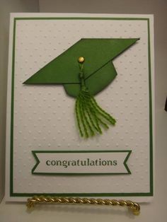 congratulations card with green graduation cap and tassel