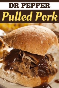 a pulled pork sandwich with barbecue sauce on it