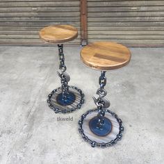 two wooden stools sitting on top of each other