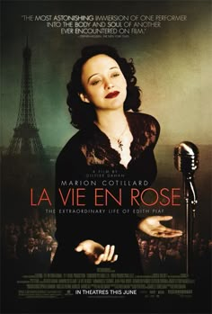 a movie poster for la vie en rose with a woman holding a microphone in front of the eiffel tower