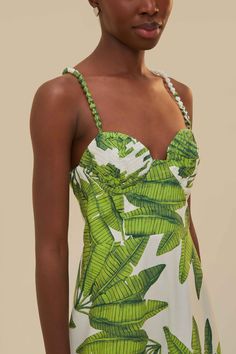 Breathe in the tropical allure of the Palm Fan Off-White Midi Dress, adorned with a refreshing green palm leaf print. This enchanting piece features a flattering sweetheart neckline and playful braided straps, creating a harmonious symphony of natural elegance and graceful femininity. The tiered skirt dances around the mid-calf, promising to whisk you away on an endless summer adventure with every swish. Indulge in the beauty of nature elegantly draped in this exquisite FARM Rio creation. Compos Palm Springs Fashion, Palm Fan, True Spring, Tropical Dress, White Midi, Summer Solstice, Vacation Dresses, Farm Rio, White Midi Dress