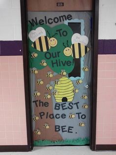 a door decorated with bees and the words welcome to our hives, the best place to bee