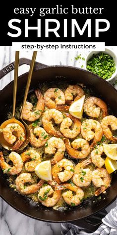 shrimp in a skillet with lemon wedges and parsley garnish on the side