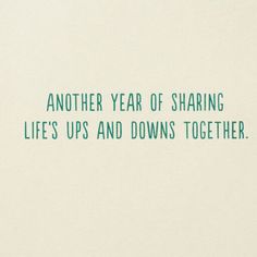 the words are written in green ink on a white paper with a black border that says, another year of sharing life's ups and downs together