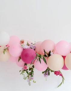 balloons and flowers are arranged in front of a white background with the words cora, van haarte geffeneichered en een fine dag god's zegen in je newe