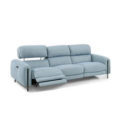 the reclining sofa is made from light blue fabric