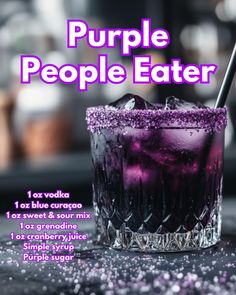 a purple drink with ice and sprinkles