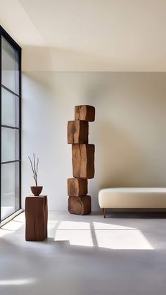 a living room filled with furniture next to a window