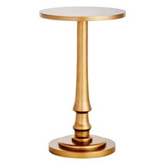 a gold pedestal with a glass top on a white background and the base is made out of metal