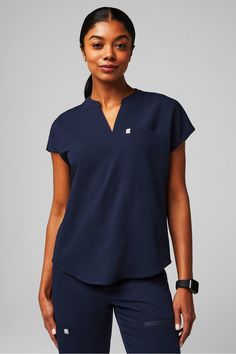 Evolve Scrub Top Fabletics Navy female Activewear >> Scrubs >> Tops >> Product Feed MotionTech regular 4-Way Stretch/Breathable/Hidden Pockets/Lightweight Scrub Top With Jeans, Navy Scrubs Outfit, Fabletics Scrubs, Female Activewear, Navy Scrubs, Nurse Scrubs, Scrub Style, Scrubs Outfit, Figs Scrubs