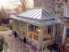 an aerial view of a house with many windows