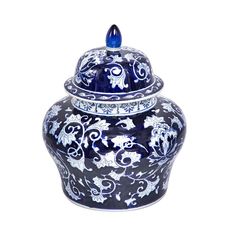 a blue and white vase with an ornate design on the lid is shown against a white background