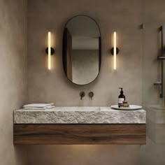 a bathroom with two sinks and a large mirror