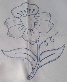 a piece of paper with a drawing of a flower on it