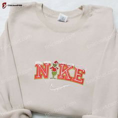 Introducing the Grinch Snow x Nike Embroidered Shirt, the perfect blend of style and holiday spirit. Made with high-quality materials and meticulously embroidered, this shirt showcases the iconic Grinch character in a unique and festive design. The soft and comfortable fabric ensures a cozy fit, making it ideal for the winter season. Whether you’re out [...] Custom Nike Crewneck Disney, Nike Vintage Sweatshirt Stitch, Stitch Sweatshirt Nike, Pull Nike Stitch, Nike Christmas, Grinch Baby, Nike Cartoon, Disney Character Shirts, Nike Inspiration