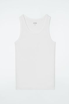 Made from organic cotton with a touch of stretch, this slim-fit tank top is an essential on warmer days. - Round neck- Sleeveless design- Organic cotton is grown from non-genetically modified seeds without chemical fertilizers or pesticides 97% Organic cotton, 3% Elastane / Machine washableBack length of size S is 24¼" Basic Spring Tank Top, Basic Fitted Vest For Spring, Fitted Basic Spring Vest, Spring Fitted Basic Vest, Spring Basic Fitted Vest, Classic Stretch Tank Top For Everyday, Basic Stretch Tops For Summer, Spring Solid Ribbed Tank Top, Spring Ribbed Tank Top