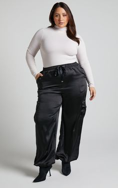 Jadeiah - Mid Rise Cargo Pocket Satin Jogger Pant in Black | Showpo USA Black Joggers Outfit, Cargo Pants Women Outfit, Satin Joggers, Cargo Pants Outfit, Joggers Outfit, Women Outfit, Black Joggers, Cargo Pocket, Casual Friday