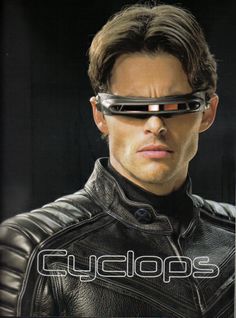 a man in a leather jacket with futuristic glasses on his face