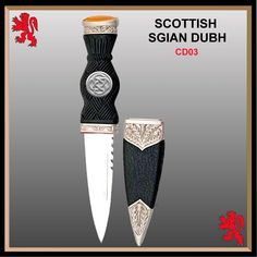 the scottish knife is black and white with red accents