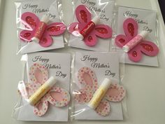 four pink butterflies with happy mother's day written on them