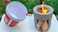 a bucket sitting next to an open fire