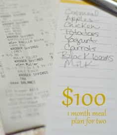 a menu and pen sitting on top of a table next to each other with the words $ 100 written on it