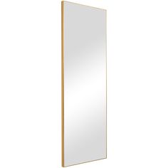 a large mirror sitting on top of a white wall