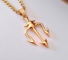 ★ Trident Head Pendant ★  A beautiful handcrafted Trident Head pendant/necklace for Men and Women. * Materials/Finishes ➤ Polished Silver 925 ➤ 24K Gold Plated over Polished Silver 925 ➤ 14K Rose Gold Plated over Polished Silver 925 * Dimensions ➤ 4.1 x 2.4 x 0.5 cm (~ 1.6 x 0.9 x 0.2 inches)/Bail: Suitable for up to 3.0 mm (~ 0.1 inches) Chain * Weight: ~ 8 grams (in Silver 925) ----------------------------------------------------------------------------- IMPORTANT NOTES: ----------------------------------------------------------------------------- ➤ When buying from Gold and Silver Designs you will also receive as a gift: ✔ A Silver/Gold/Rose Gold Plated Steel Chain ✔ Free Shipping Worldwide (Standard Shipping Option) ✔ A discount coupon code for -25% on your next order ✔ A beautiful Bag Bluejay Bird, Trident Necklace, Virgo Scorpio, Gemini Leo, Raw Peridot, Chip Necklace, Zodiac Gemini, Nautical Necklace, Peridot Necklace