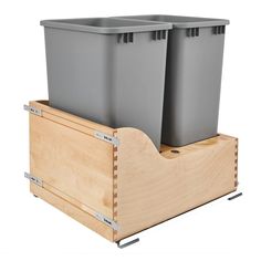 two plastic bins sitting on top of a wooden box