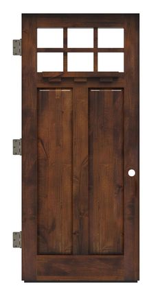 the front door is made from wood and has two sidelights on each side, one with