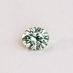 1.54CT OVAL PRECISION CUT MONTANA SAPPHIRE, MEDIUM LIGHT YELLOW GREEN, 7.1X6.2MM Light Yellow, Montana