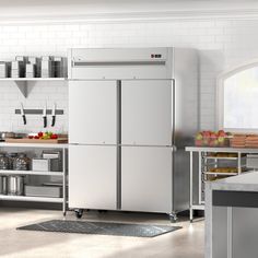 a white refrigerator freezer sitting inside of a kitchen