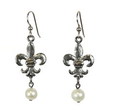 a pair of silver fleur de lis earrings with pearls