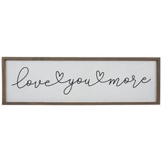 a sign that says love you more with the word's in cursive writing