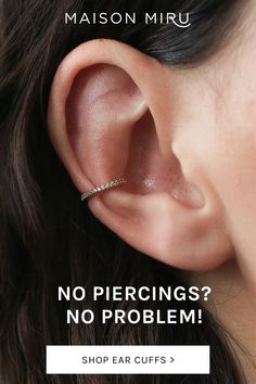 a woman's ear with the words, no piercings? no problem shop ear cuffs