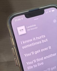 someone is holding their cell phone up to show the text on its screen that reads, i know it hurts sometimes but you'll get over it