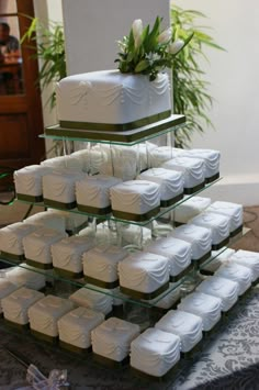 a wedding cake is stacked on top of each other