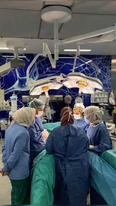 doctors performing surgery in an operating room