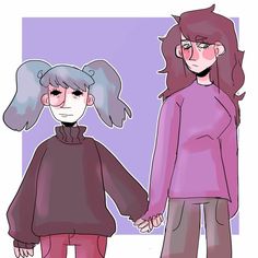 two people holding hands while standing in front of a purple wall and one person wearing a pink sweater