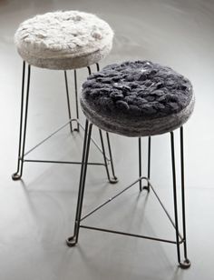 two stools sitting on top of each other