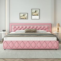 a bed with pink upholstered headboard and foot board in a white room