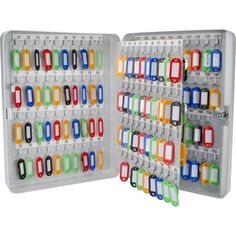 an open plastic storage box filled with lots of keys